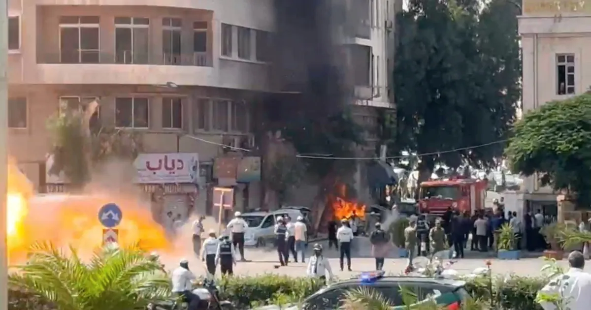 Explosive Devices Detonate in Damascus, Injuring Eighteen During Macron's Visit