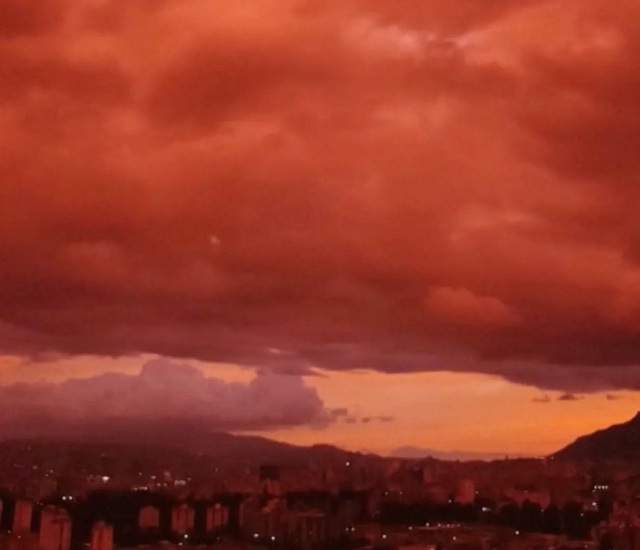 Unusual Red Sunset Graces Caracas Amidst Ongoing Rescue Operations